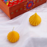 Ganesha Idol with Set of 2 Modak Diyas - Yellow
